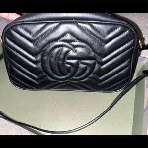 Black crossbody authentic Gucci purse gently worn.